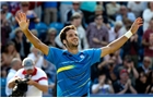 EASTBOURNE, ENGLAND - JUNE 21:  Feliciano Lopez of Spain celebrates winning the Men's Final between Richard Gasquet of France and Feliciano Lopez of Spain at the Aegon International at Devonshire Park on June 21, 2014 in Eastbourne, England.  (Photo by Ben Hoskins/Getty Images)